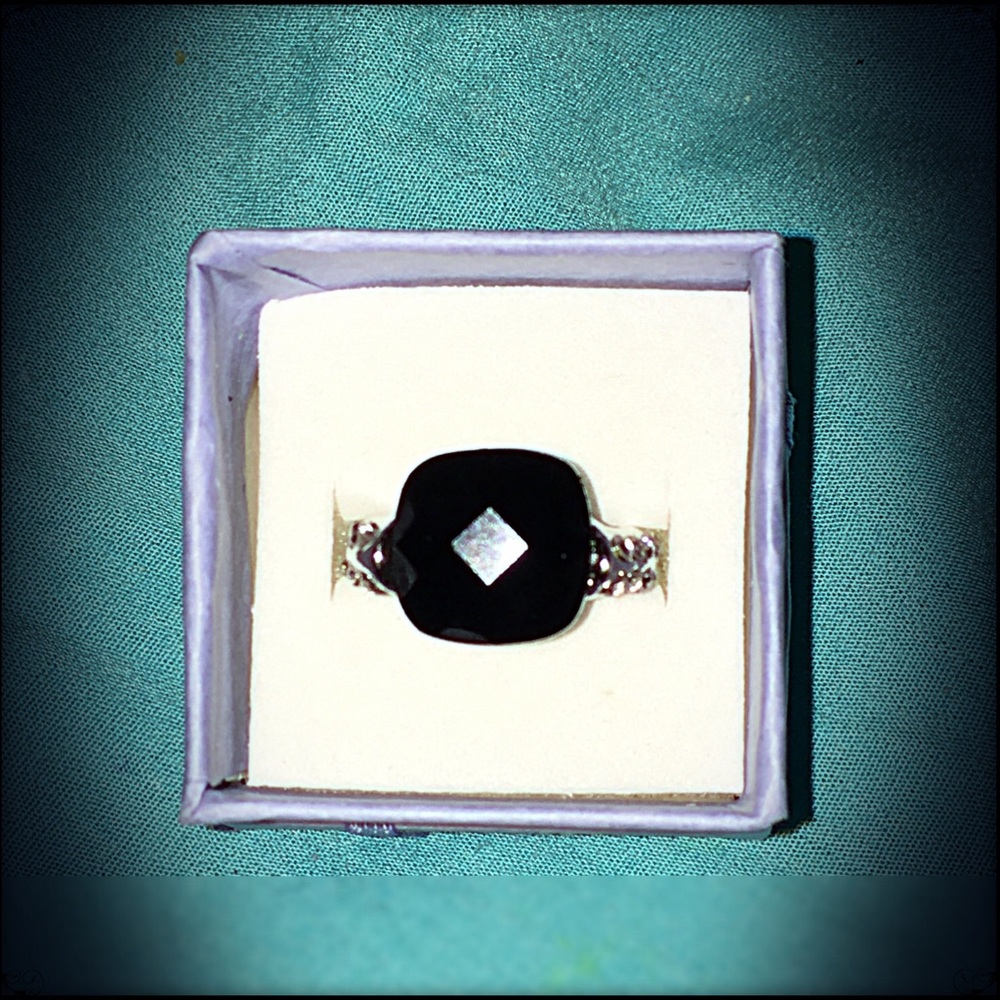 Black onyx and diamond ring